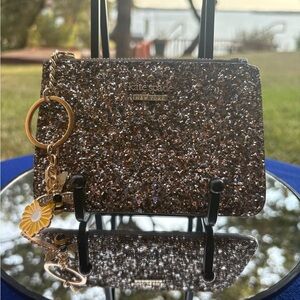 Kate Spade Glittery Card holder. New w/o box. MSRP $89.00. Price: $35.00.